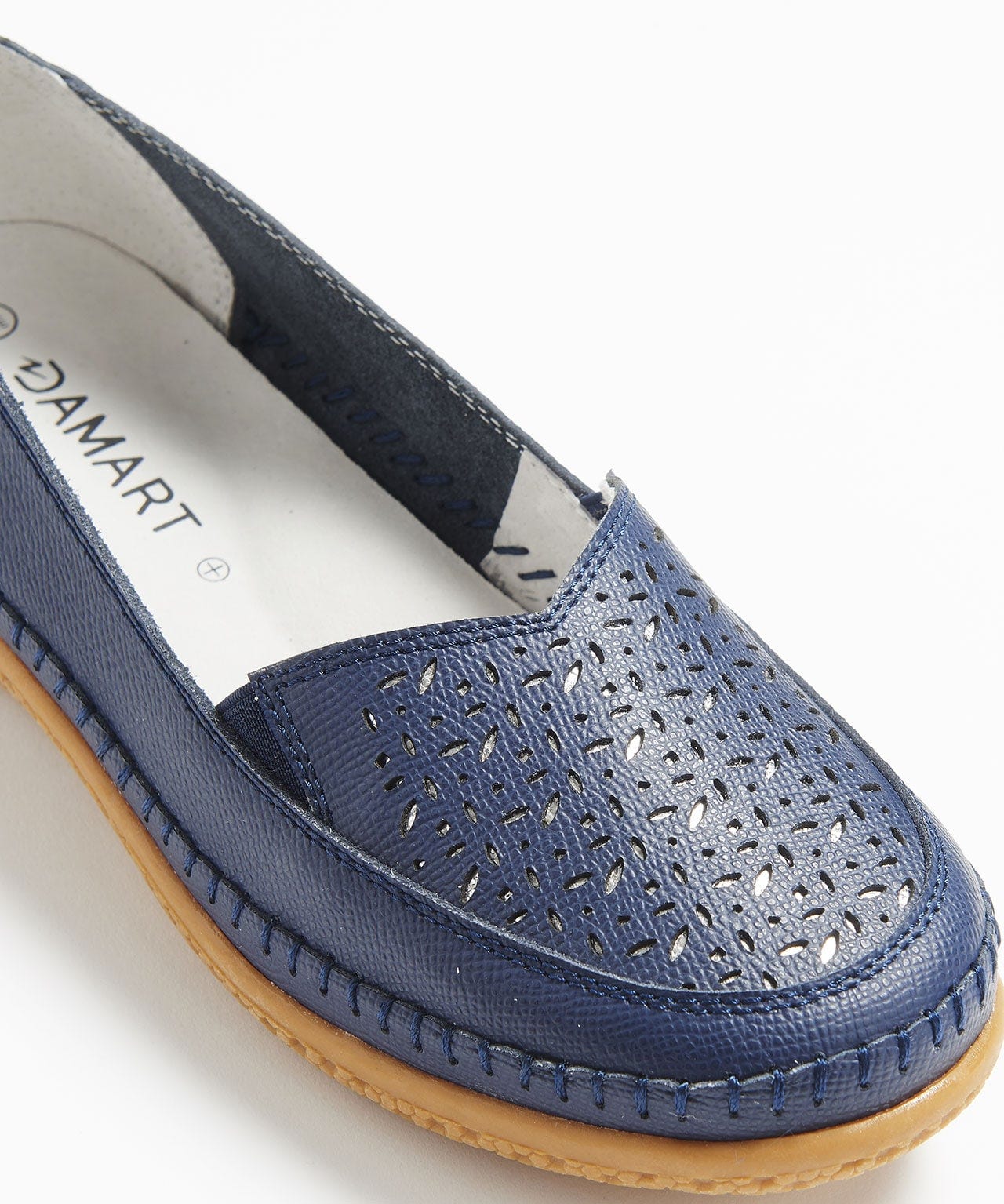 Mocassins compensés avec jeu de perforations