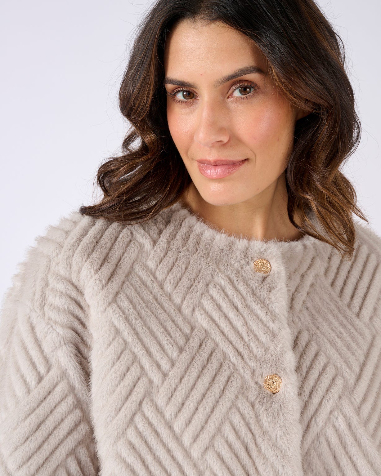 Veste imitation fourrure et suédine