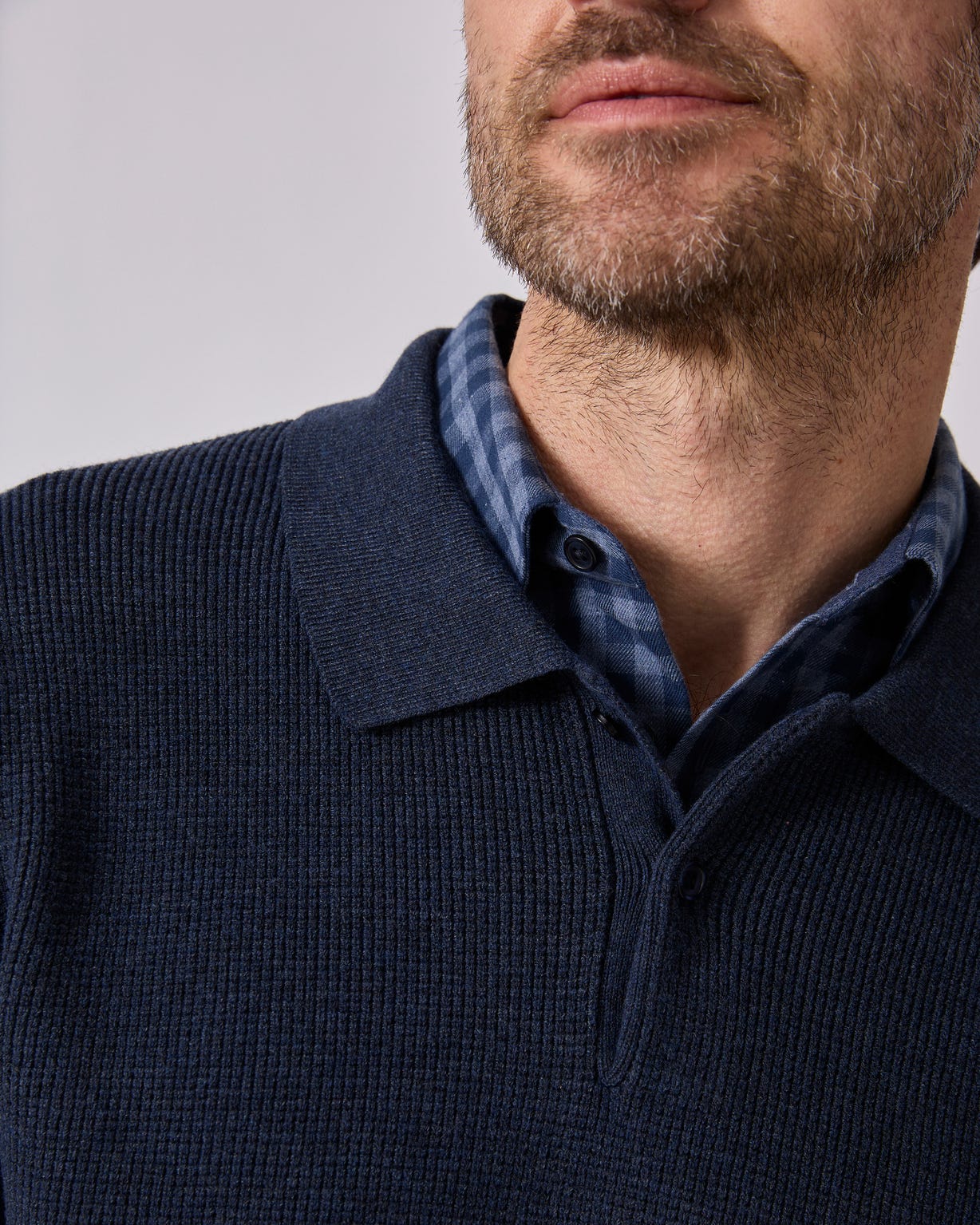 Pull Thermolactyl col polo en maille texturée.