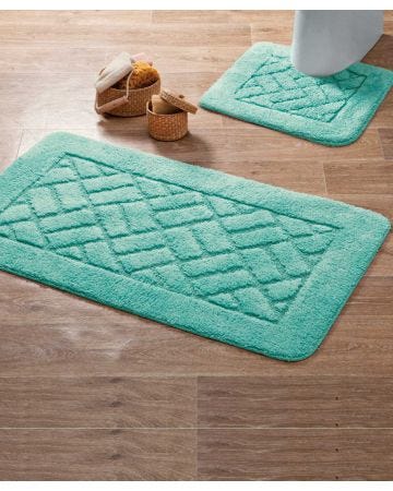 Tapis de bain motif losanges.