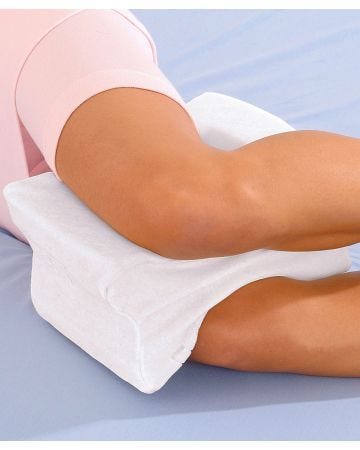 Coussin de genou ergonomique.