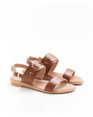 Sandales à talon plat avec boucle fantaisie