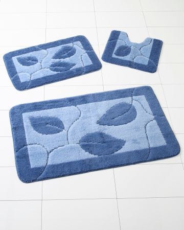 Tapis de bain motif feuilles.