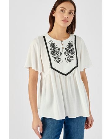 Blouse brodée à manches papillon