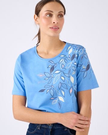 T-shirt motif feuilles placé