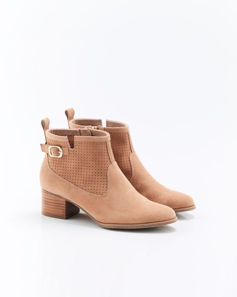 Bottines dessus croûte de cuir perforée