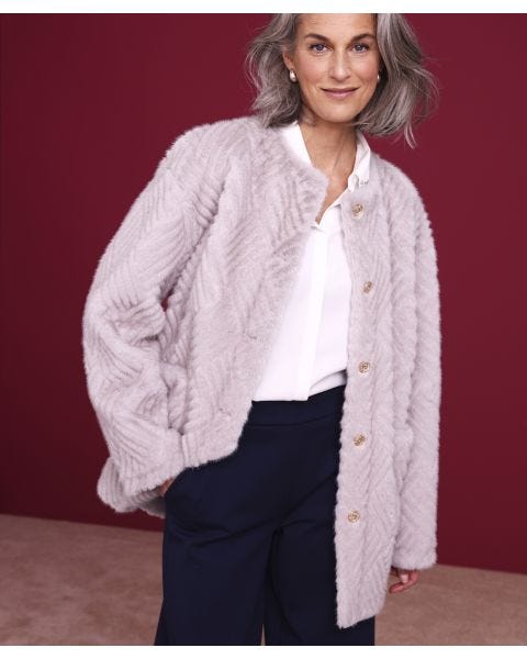 Veste imitation fourrure et suédine