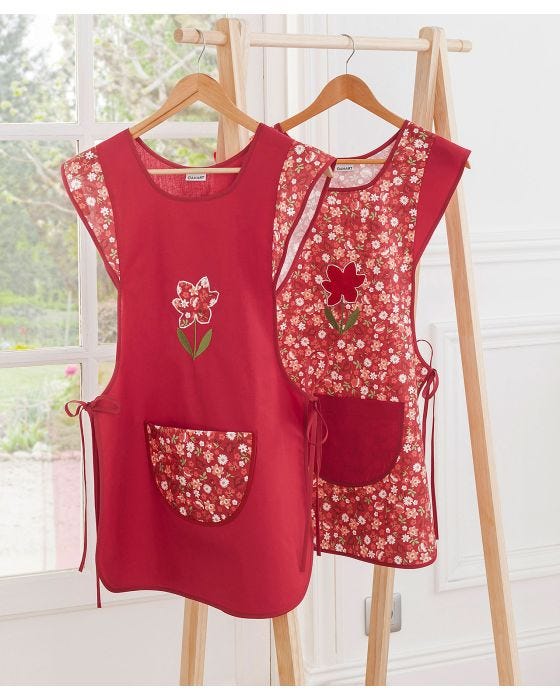 Lot de 2 tabliers chasuble uni et fleuri. Damart